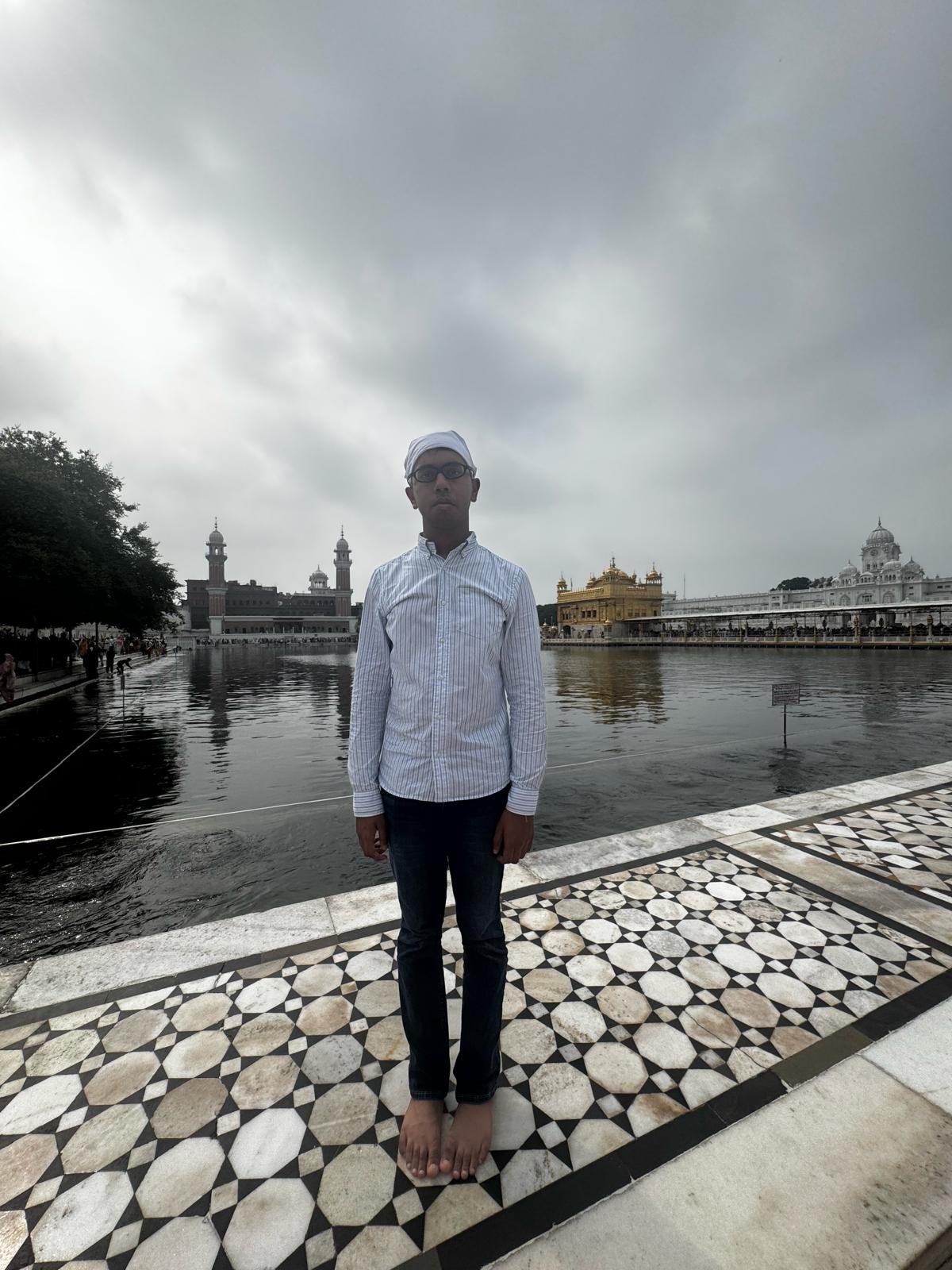 Standing barefoot beside the Amrit Sarovar at the Golden Temple