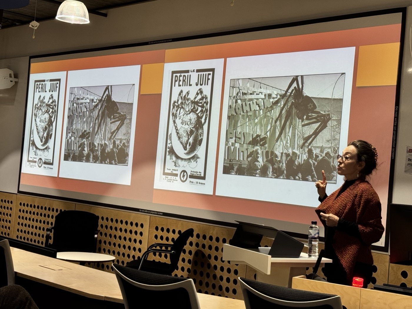 Lecture slide showing anti-zionist and antisemitic imagery discussed during the talk